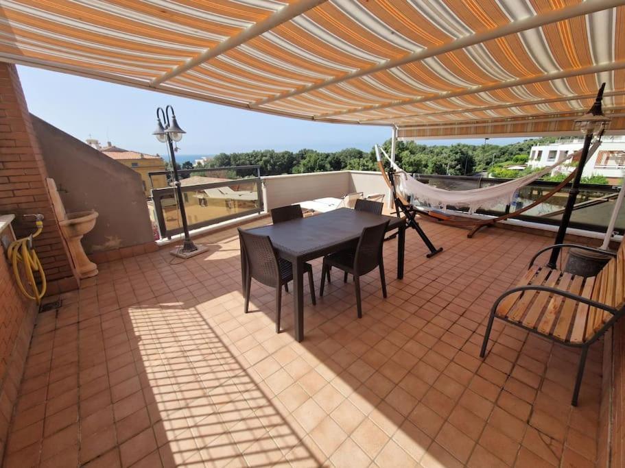 Terrazza A Nettuno E Chiesa Giubilare Santa Maria Goretti Extérieur photo